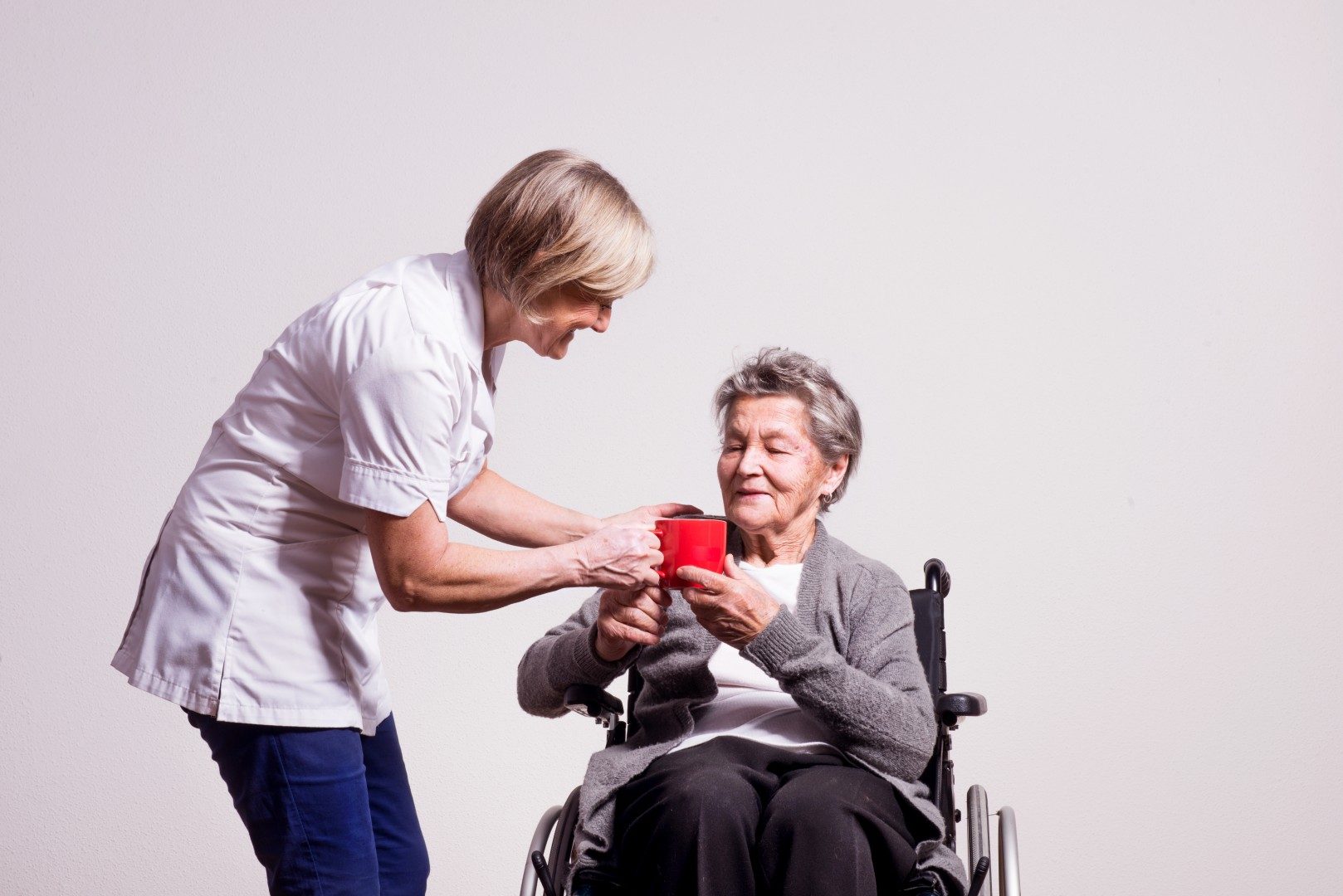studio-portrait-of-a-senior-woman-in-wheelchair-an-px7vawd